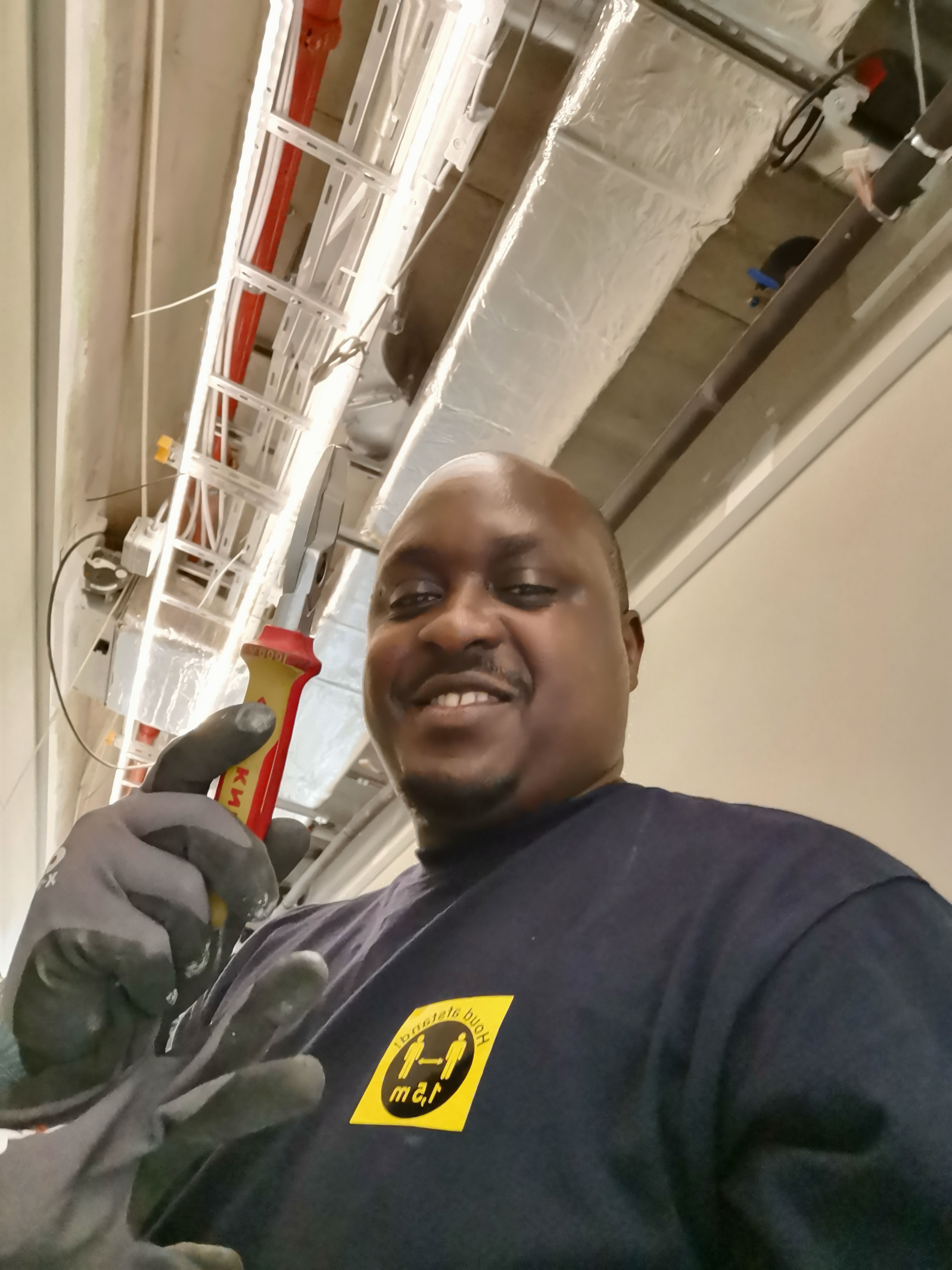 Astratech technician on site with tools